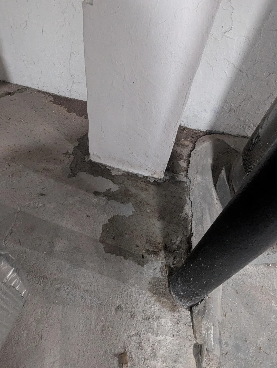 Basement waterproofing Syracuse NY crew carrying out crawl space repair beneath a city home