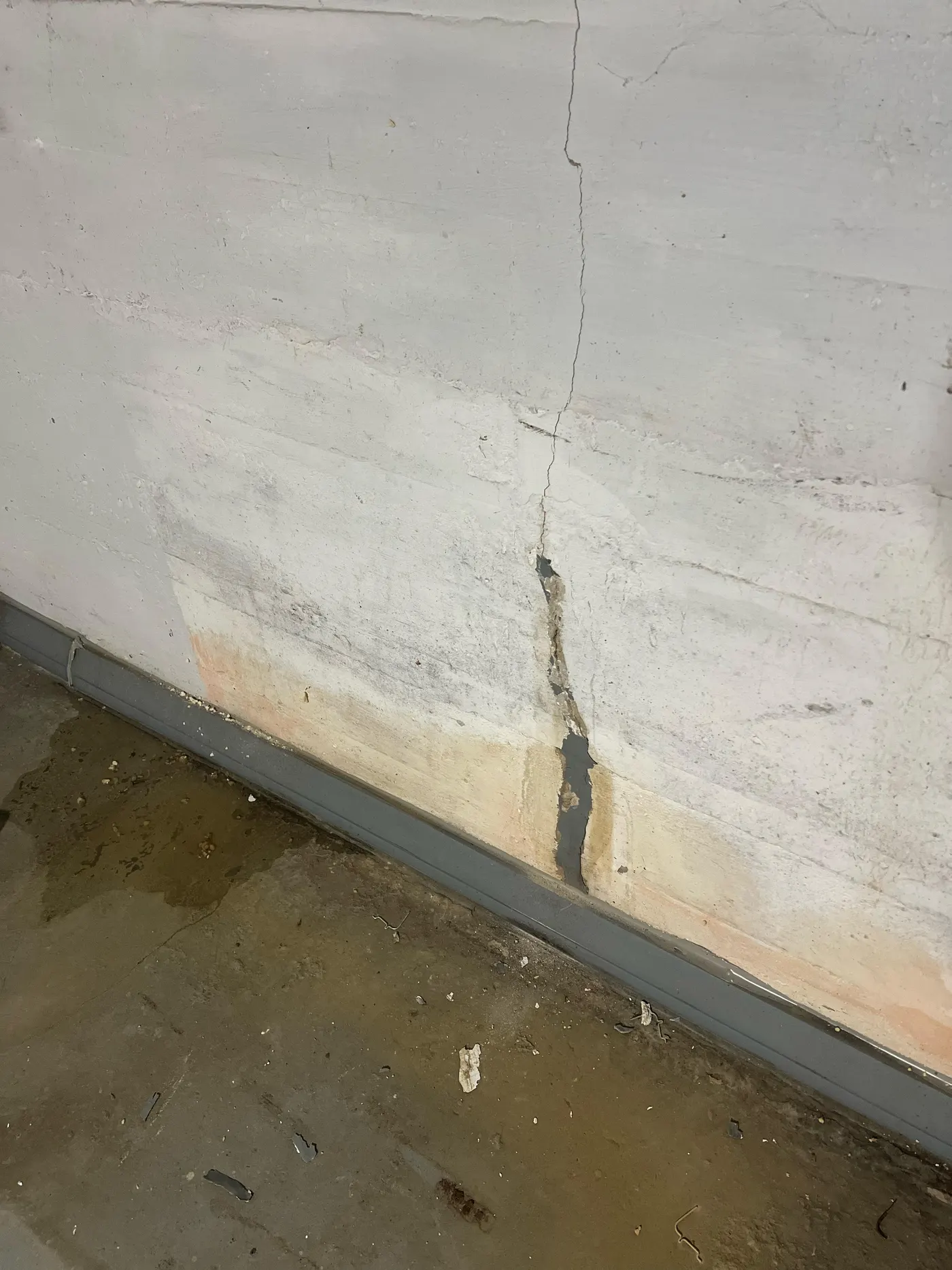 Old cement patch replaced by basement waterproofing on the Northside, Syracuse